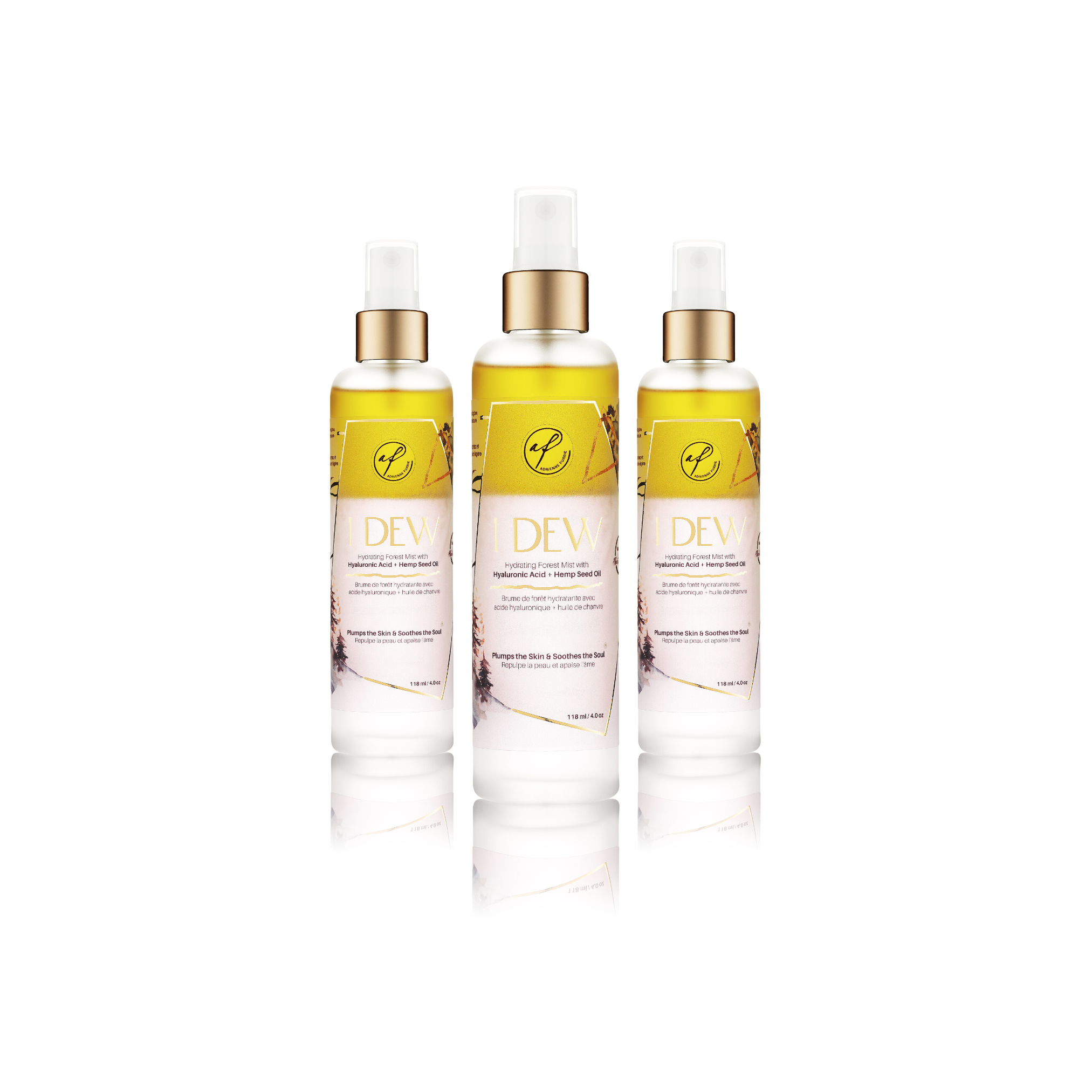 Three facial mist spray bottles labeled 'I Dew' containing a hyaluronic acid and hemp seed oil-based hydrating facial mist, positioned against a white background.