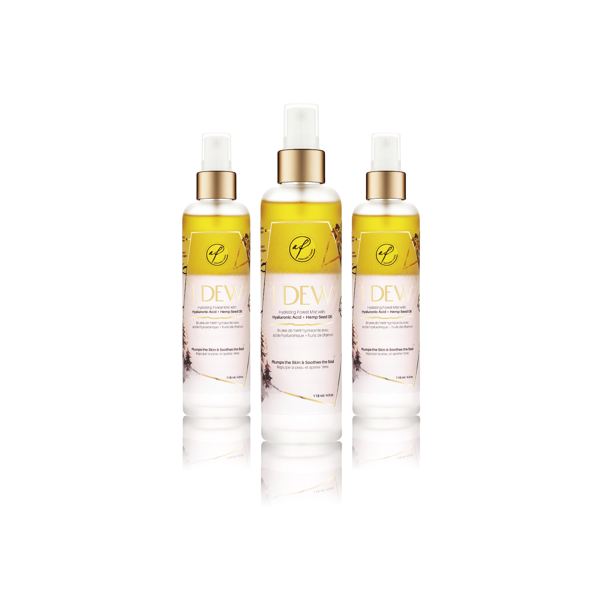 Three facial mist spray bottles labeled 'I Dew' containing a hyaluronic acid and hemp seed oil-based hydrating facial mist, positioned against a white background.