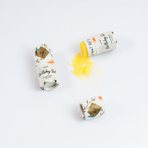 Birthday Suit all natural lip balm with cap off showing its colour