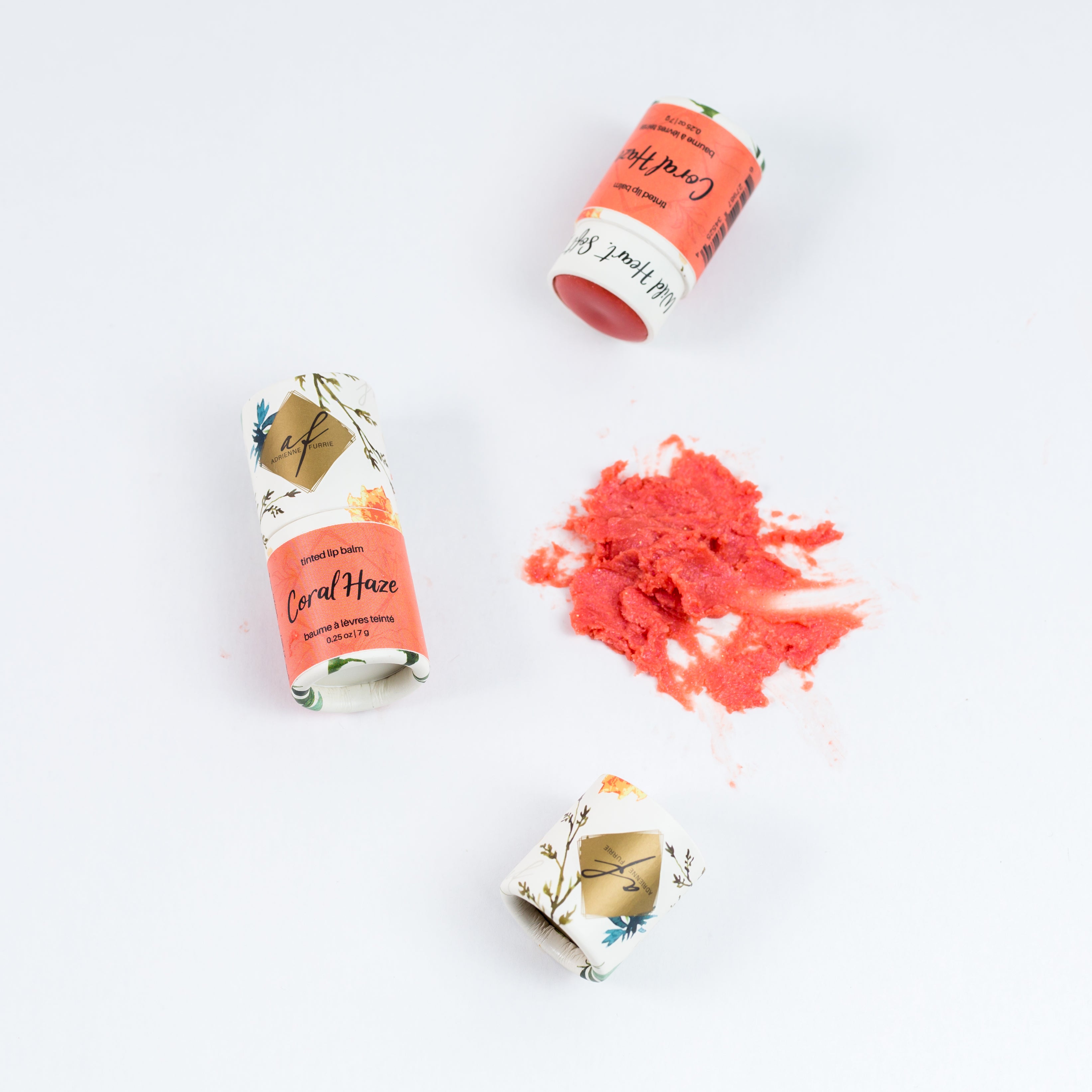 individual natural tinted lip balm showing packaging and colour